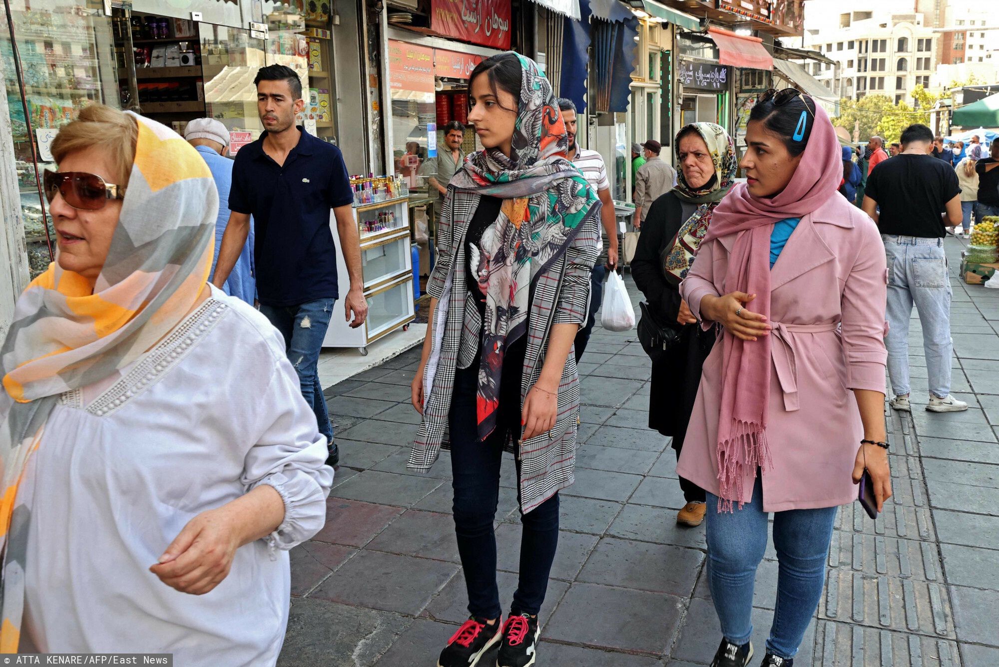 TemporaryIranians women shop at Tajrish bazaar in the capital Tehran, on September 20, 2022. (Photo by ATTA KENARE / AFP)ATTA KENARE