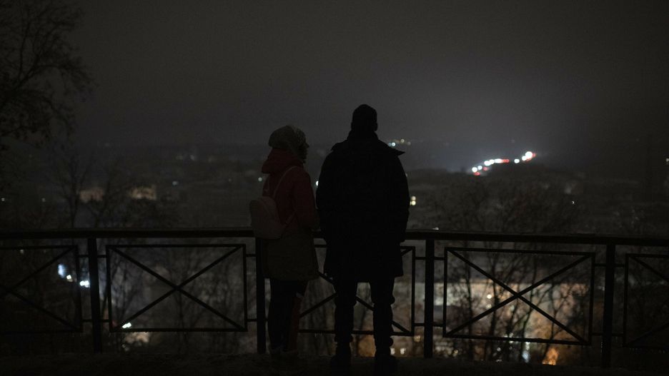 Temporary
People stand amid a blackout after a Russian rocket attack in Kyiv, Ukraine, Wednesday, Nov. 23, 2022. Russia unleashed a new missile onslaught on Ukraine's battered energy grid Wednesday, robbing cities of power and some of water and public transport, too, compounding the hardship of winter for millions. The aerial mauling of power supplies also took nuclear plants and internet links offline and spilled blackouts into neighbor Moldova. (AP Photo/Andrew Kravchenko)
Andrew Kravchenko