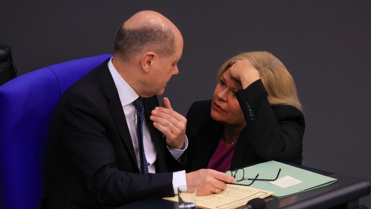 Olaf Scholz, Germany's chancellor, left, and Nancy Faeser, Germany's interior minister, at the Bundestag in Berlin, Germany, on Tuesday, Nov. 28, 2023. Scholz promised that his government will forge ahead with investments needed to modernize the economy and maintain international competitiveness even after this month's court ruling upended its budget planning. Photographer: Krisztian Bocsi/Bloomberg via Getty Images