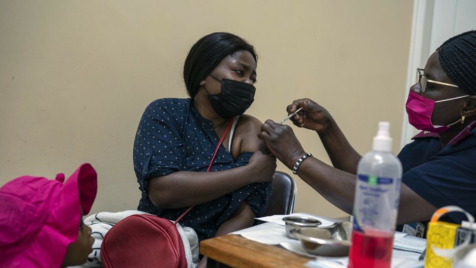 arch48A woman receives a dose of COVID-19 vaccine in Johannesburg, South Africa, on Tuesday, Nov. 30, 2021. Vaccines are finally available in many African countries, but some people there, as well as in South Asia, are wary of taking them. (Joao Silva/The New York Times)JOAO SILVA