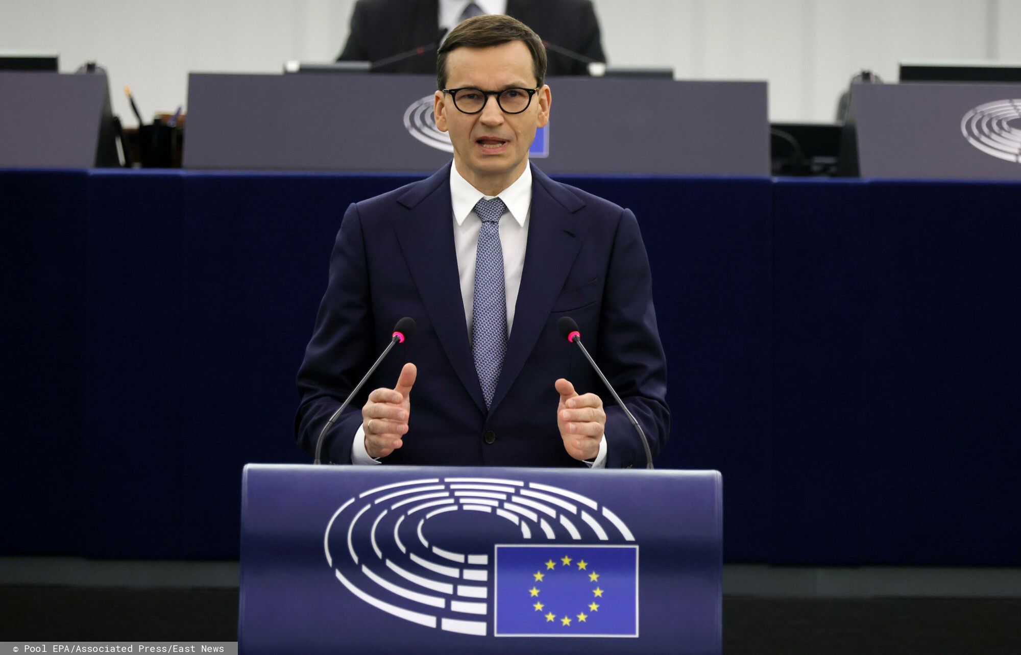 Przemowa premiera Morawieckiego w Parlamencie EuropejskimPoland's Prime Minister Mateusz Morawiecki, center, delivers his speech Tuesday, Oct. 19, 2021 at the European Parliament in Strasbourg, eastern France. The European Union's top official locked horns Tuesday with Poland's prime minister, arguing that a recent ruling from the country's constitutional court challenging the supremacy of EU laws is a threat to the bloc's foundations and won't be left unanswered. (Ronald Wittek, Pool Photo via AP)Pool EPA