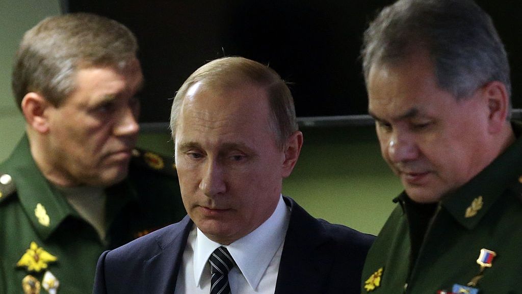 Leaders Attend National Defense CenterMOSCOW, RUSSIA - MARCH,11: (RUSSIA OUT)  Russian President Vladimir Putin (C), Chief of General Staff of Armed Forces Valery Gerasimov (L) and Defense Minister Sergei Shoigu (R) are seen while visting the National Defense Center in Moscow, Russia, March,11,2016. Putin holds military products acceptance day at the National Defense Center to hear leaders of Russian military-building complex, heads of military industry companies,  commanders of military units and high-ranged officers of the Ministry of Defense. (Photo by Mikhail Svetlov/Getty Images)Mikhail Svetlovbeauty, contest, Moscow, police, Russia