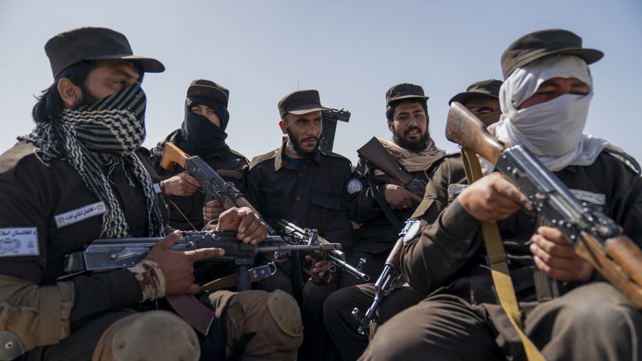 KANDAHAR, AFGHANISTAN-MAY 7:
Taliban police officers ride in the back of a police truck to patrol near a checkpoint in Kandahar, Afghanistan on May 7, 2024. Taliban checkpoints are used to check for security threats and for illicit goods, such as opium.

For decades, Afghanistan was the top exporter of opium in the world, accounting for more than 80 percent of the global supply prior to last year. Two-thirds of the country's opium poppies were grown in southern Afghanistan, where temperatures in the last fifty years increased by up to 4.3 degrees Fahrenheit. The hardy plants thrived despite the harsh, salty desert landscape. Farmers relied on the crop to make their living through droughts and heat. Two years ago, after the Taliban took power in Afghanistan, they banned opium on religious grounds. Afghan farmers turning to alternative crops are finding that many no longer grow well because of the impact of climate change. This is forcing some farmers to abandon their fields, while others are weighing whether they should continue to comply with the ban on poppy cultivation. 
(Photo by Carolyn Van Houten/The Washington Post via Getty Images)