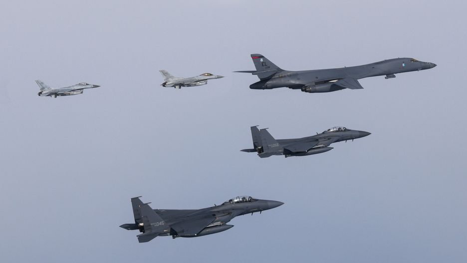 South Korea And US Hold Joint Air Defense Drills
UNDISCLOSED LOCATION, SOUTH KOREA - MARCH 03: In this handout image released by the South Korean Defense Ministry, A U.S. Air Force B-1B bomber, and South Korean Air Force F-15K and KF-16 fighter jets fly over South Korea Peninsula during a joint air drill on March 03, 2023 at an undisclosed location in South Korea. The United States will continue to counter threats posed by North Korea through close cooperation with its allies, Secretary of Defense Lloyd Austin said Thursday. (Photo by South Korean Defense Ministry via Getty Images)
Handout