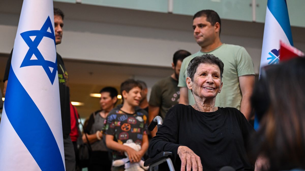 TEL AVIV, ISRAEL - OCTOBER 24: Yocheved Lifshitz (C) speaks to the media at Ichilov Hospital after she was released by Hamas last night, on October 24, 2023 in Tel Aviv, Israel. Last night, two hostages taken by Hamas on October 7th, Nurit Cooper and Yocheved Lifshitz, were released to the Red Cross within Gaza and returned to Israel. This followed the release of two other hostages, both US nationals, who were released on Saturday. (Photo by Alexi J. Rosenfeld/Getty Images)