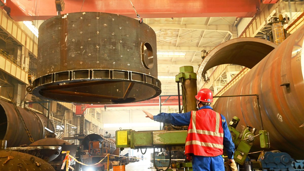 QINGDAO, CHINA - OCTOBER 31, 2024 - A construction worker builds petrochemical equipment parts at Lanshi Heavy Machinery Co., LTD., Hongshiya Street, Qingdao, Shandong province, Oct 31, 2024. (Photo credit should read CFOTO/Future Publishing via Getty Images)