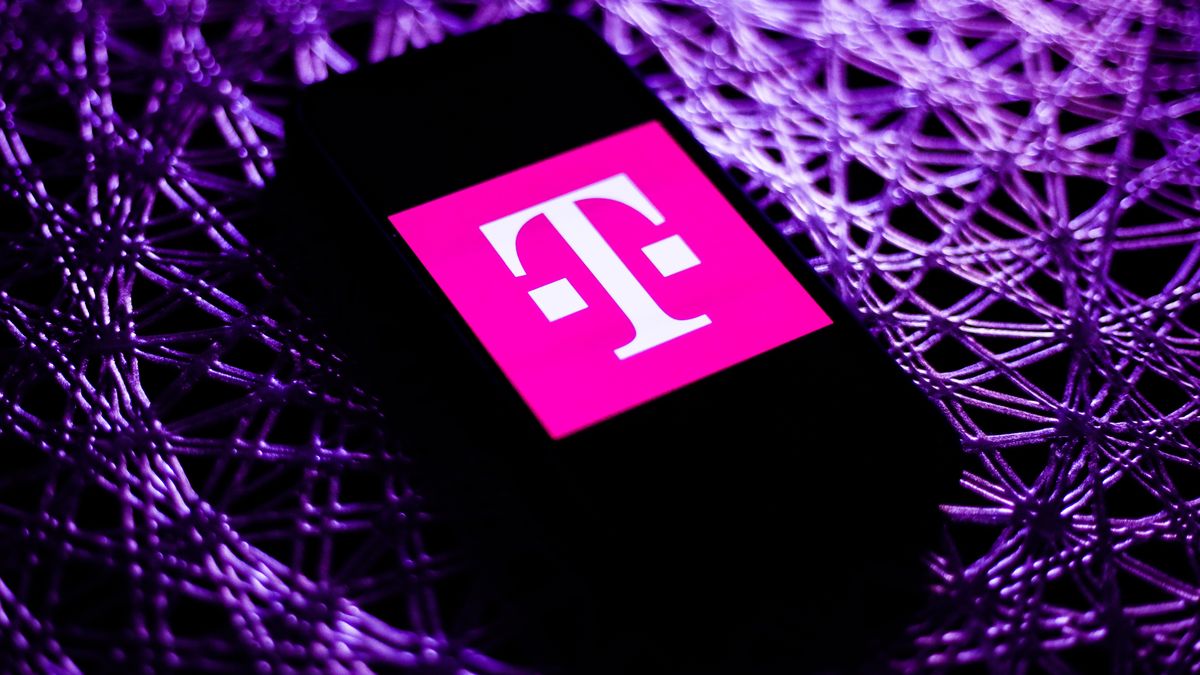 T-Mobile logo is seen displayed on a phone screen in this illustration photo taken in Poland on November 19, 2020. (Photo by Jakub Porzycki/NurPhoto via Getty Images)