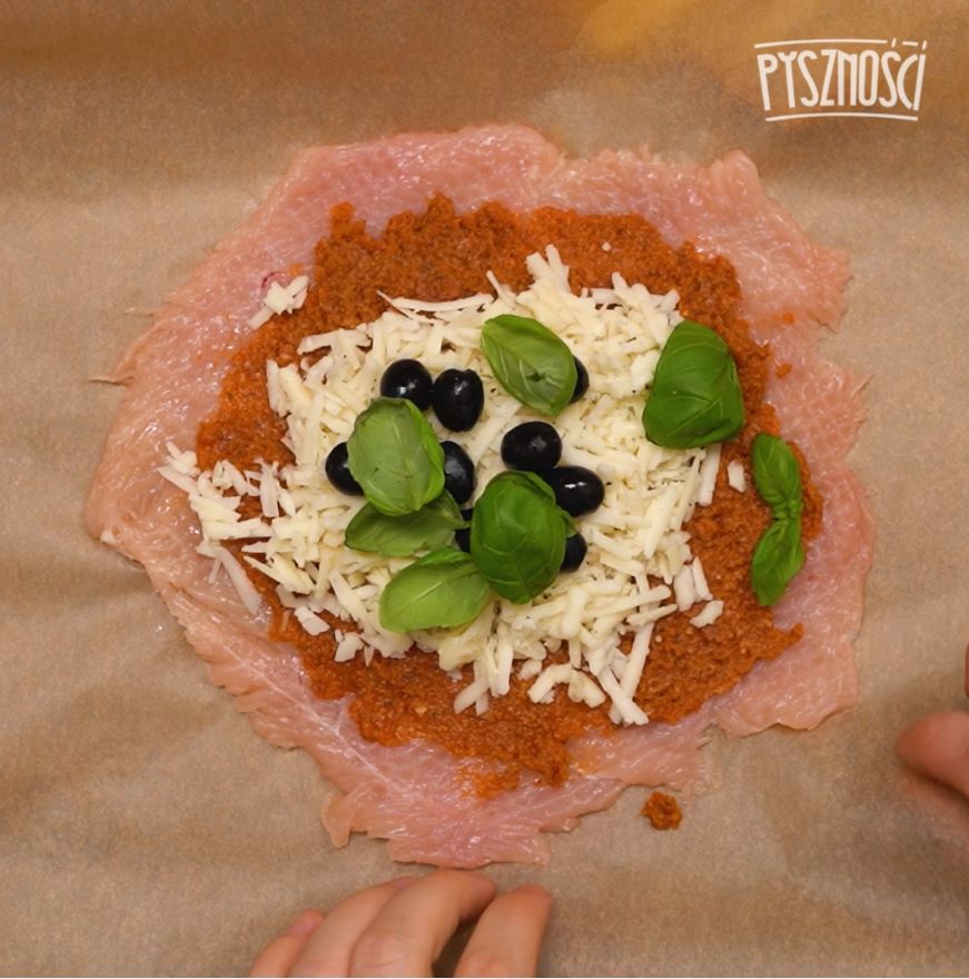 Chicken calzone with pesto, cheese, and olives
