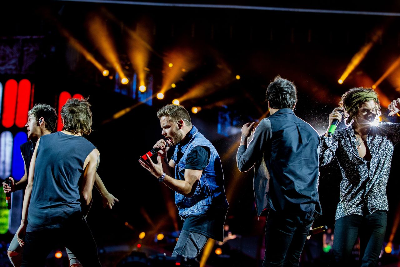 AMSTERDAM, NETHERLANDS - JUNE 24: Liam Payne of One Direction performs live on stage at Amsterdam Arena on June 24, 2014 in Amsterdam, Netherlands. (Photo by Paul Bergen/Redferns)