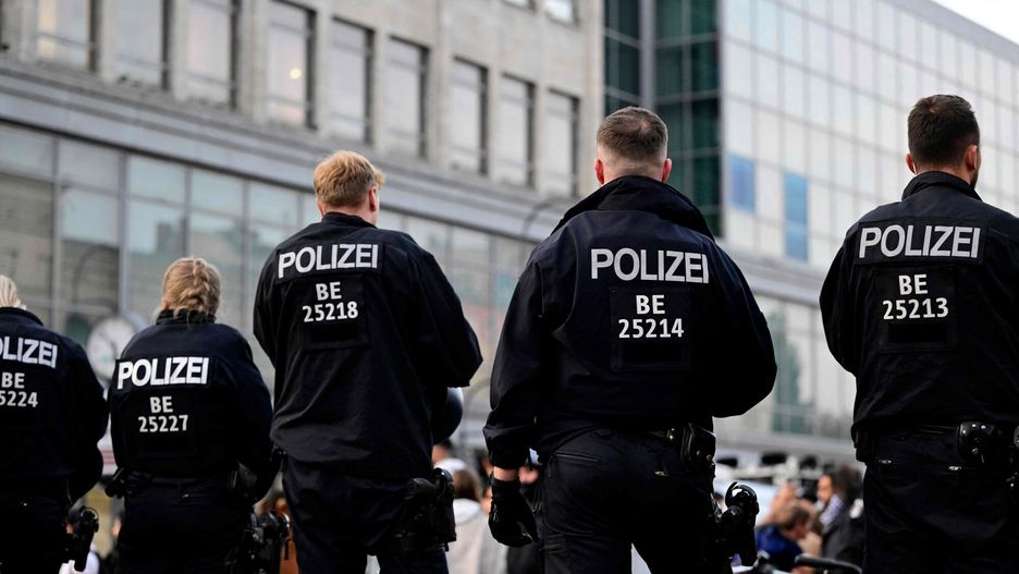 Temporary
Riot police officers stand guard at Herrmannplatz, Berlin on October 11, 2023, as gatherings took place in solidarity with Palestine despite a police ban in the German capital, five days after Palestinian militants launched a surprise attack on Israel, which has responded with a massive bombardment of Gaza. Israel is reeling from the deadliest attack in its 75-year history, as more than 1,500 militants stormed through the Gaza security barrier in their coordinated land, air and sea attack on the Jewish Sabbath. Israel has been relentlessly pounding Hamas targets in Gaza in response, and the war has already claimed the lives of more than 3,700 lives of Israeli and Palestinian civilians, soldiers and combatants. (Photo by John MACDOUGALL / AFP)
JOHN MACDOUGALL