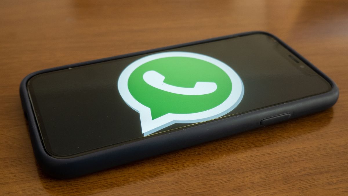 A Whatsapp logo displayed on a smartphone is seen in L'Aquila, Italy, on April 10th, 2024. On April 11th, Whatsapp will introduce updates to allow Whatsapp users to receive message from other apps.  (Photo by Lorenzo Di Cola/NurPhoto via Getty Images)