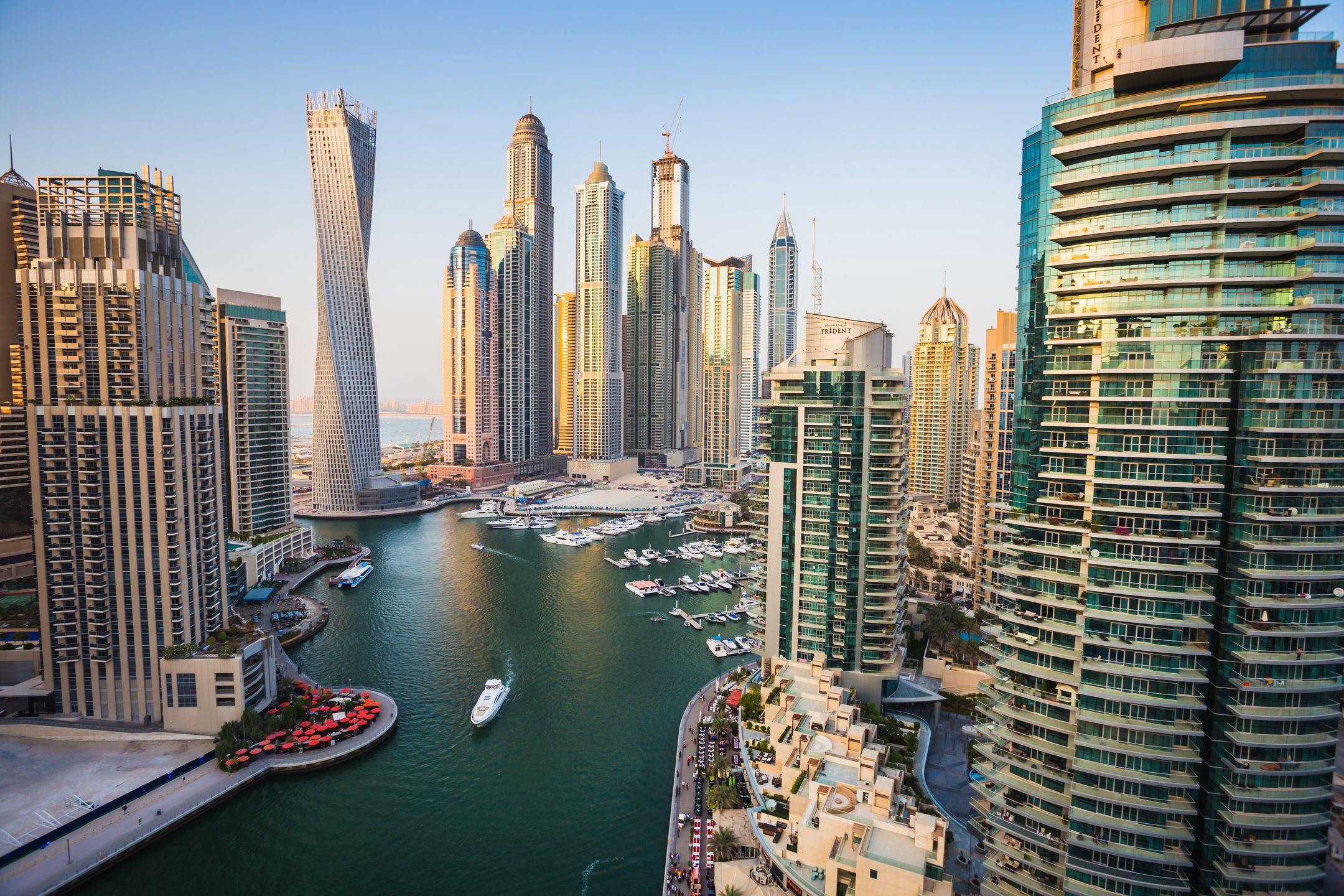 Dubai Marina. UAEDUBAI, UAE - NOVEMBER 2: Dubai Marina. UAE. November 2, 2013. Dubai was the fastest developing city in the world between 2002 and 2008.Oleg Zhukovdubai, marina, building, lights, view, arabian, panorama, port, yacht, resort, evening, dusk, jumeirah, modern, boat, tourism, scene, water, arab, uae, skyscraper, downtown, tower, travel, illuminated, urban, middle, gulf, highrise, skyline, luxury, twilight, united, futuristic, reflection, high, architecture, city, emirates, sky, residential, construction, promenade, exterior, harbor, cityscape