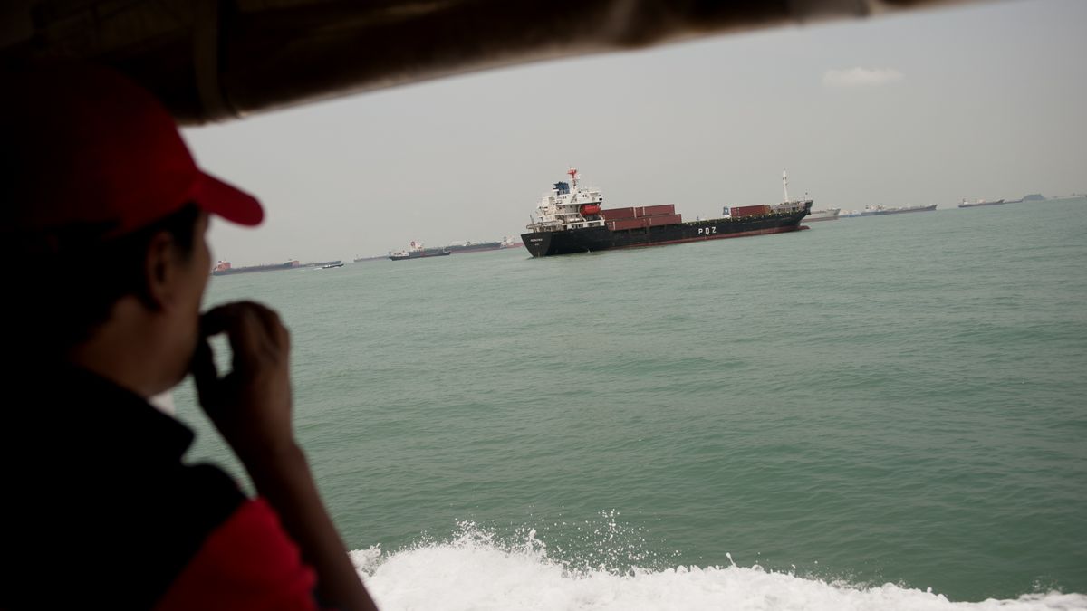 Malacca Strait Pirates
INDONESIA - 2011/04/26: A sailor takes a cigarette break during his session on a freighter ship that is anchored in the Strait of Malacca.

585 people were taken hostage, six crew members were killed and 32 more were left injured from pirate attacks in 2012. The reported piracy in 2012 accumulated up to 297 seizures compared to about 439 in 2011. Part of the decline is due to effective combat against Somalian pirates. On a global basis, it is reported that cargo, bulk, container vessels and oil tankers are most at risk from pirate attacks, however, there have been cases targeted against fisherman and fishing boats. 

The Strait of Malacca is a narrow passage of the Indian Ocean located between the island of Sumatra and the Malay Peninsula in Southeast Asia. The Strait's bordering countries are: Indonesia, Malaysia and Singapore. It is around 800 km long at the narrowest parts only 2.5 km wide. Currently the world's busiest waters with approximately 60,000 ships passing per year. The transfers that happen through the Straits account for up to a quarter of total world trade making it of high importance to Germany, Russia and the USA. 

In International Maritime Bureau (IMB) was established in 1981 as a special division within the International Chamber of Commerce (ICC) for the prevention and monitoring of all types of maritime crime, fraud, smuggling, hijacking and more. As part of the escalation in piracy, the IMB created a special section called the Piracy Reporting Centre in 1992 with headquarters in Kuala Lumpur, Malaysia. The organization serves as a direct link between the crew members in distress and crime prevention authorities. Alerts and updates are coordinated and transmitted via satellite to the vessel that is in range of any attacks. (Photo by Jonas Gratzer/LightRocket via Getty Images)
Jonas Gratzer
asia, asian, boat, boats, cargo, crime, freighter, malacca, man, men, ocean liner, people, philippines, pirate, pirates, poor, poverty, sea, ship, smoking, south east asia, strait of malacca, thief, thieves