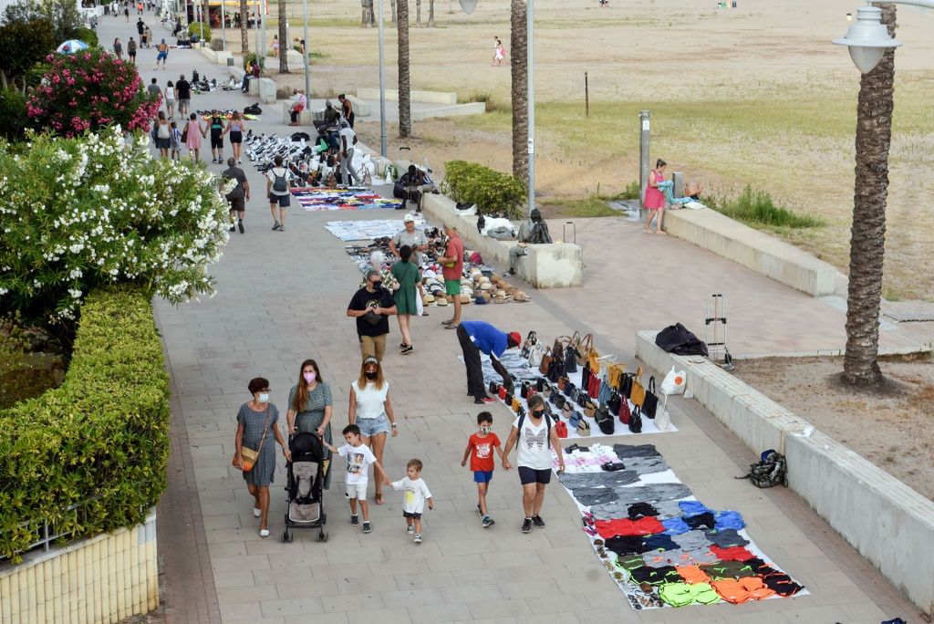Tourists in Spain face fines for buying counterfeit goods from street stalls