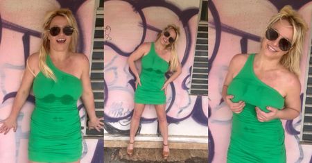 Britney Spears wygina się na tle różowego graffiti, prezentując plamy potu na sukience: "Było mi gorąco" (WIDEO)