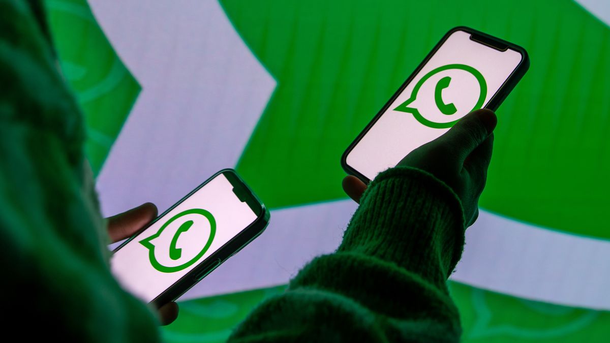 ANKARA, TURKIYE - DECEMBER 5: In this photo illustration, logos of WhatsApp are displayed on a mobile phone screen and computer screen Ankara, Turkiye on December 5, 2023. (Photo by Didem Mente/Anadolu via Getty Images)