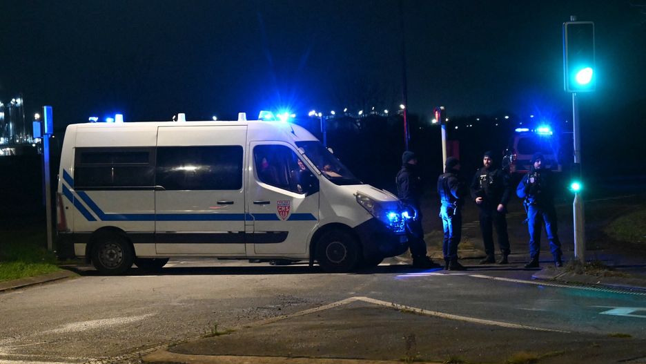 Temporary
French CRS Police (Republican Security Companies) block off a road near a migrant camp where two security guards and two migrants were shot dead, near Dunkirk, northern France, on December 14, 2024. Five people were killed on December 14, 2024 in northern France, according to the French Gendarmerie, to which a person surrendered to the authorities at the end of the day, indicating that he was the author of the murders. The first four victims killed near Dunkirk and would be two security agents and two migrants, according to the first elements reported by this source. The fifth person killed was in the commune of Wormhout. (Photo by Bernard BARRON / AFP)
BERNARD BARRON