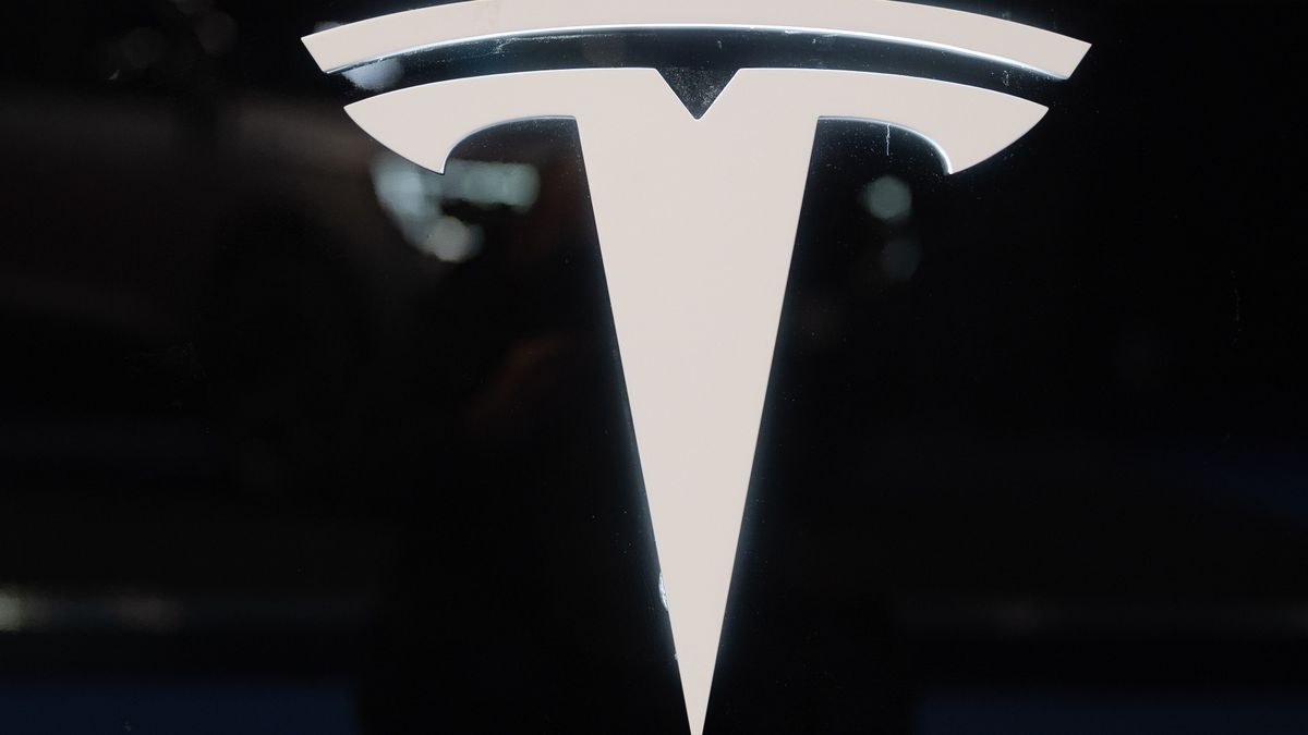 BARCELONA, SPAIN - MAY 12: Car Tesla logo is seen at the Automobile Barcelona International Motor Show in Barcelona, Spain on May 12, 2023. (Photo by Adria Puig/Anadolu Agency via Getty Images)