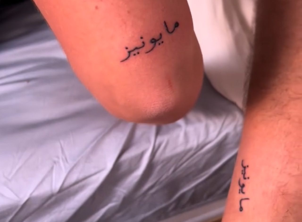 The tourist got a tattoo in Morocco.