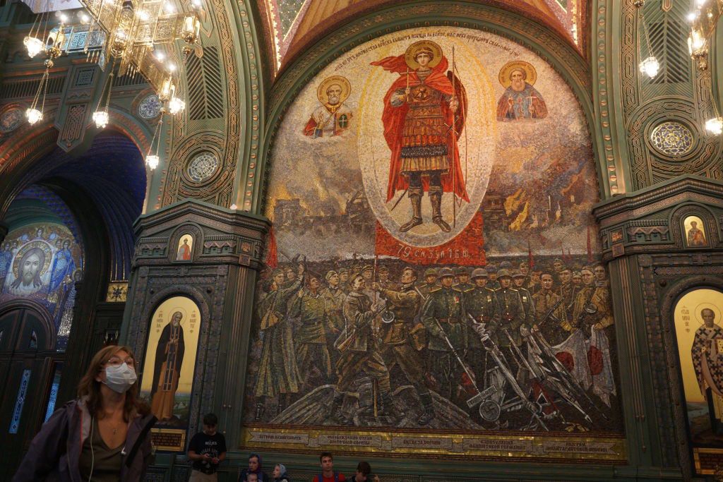 Coronavirus Outbreak in RussiaMOSCOW OBLAST, RUSSIA - JULY 17: Visitors in protective mask visit the Main Cathedral of the Russian Armed Forces (Cathedral of the Resurrection of Christ) at Patriot Park on July 17, 2020 in Moscow Oblast, Russia. The requirement to wear masks and gloves to combat a spread of the coronavirus (COVID-19) is still in effect in Moscow's region. (Photo by Mikhail Svetlov/Getty Images)Mikhail Svetlov