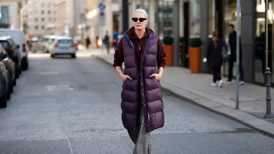 Petra van Bremen Street Style Shooting In Hamburg
HAMBURG, GERMANY - SEPTEMBER 25: (Image released on October 7) Best Ager Model and Influencer Petra van Bremen wearing a long purple down vest by Madeleine, grey checkered wide leg and high waist pants with belt by Madeleine, a chianti colored knitted v-neck hoodie by Madeleine, a black mini crossbody / belt bag by Madeleine, sunglasses by Mango and black boots by Zara during a street style shooting on September 25, 2021 in Hamburg, Germany. (Photo by Streetstyleshooters/Getty Images for MADELEINE)
Streetstyleshooters
best ager, best ager, best ager, best ager, best ager
