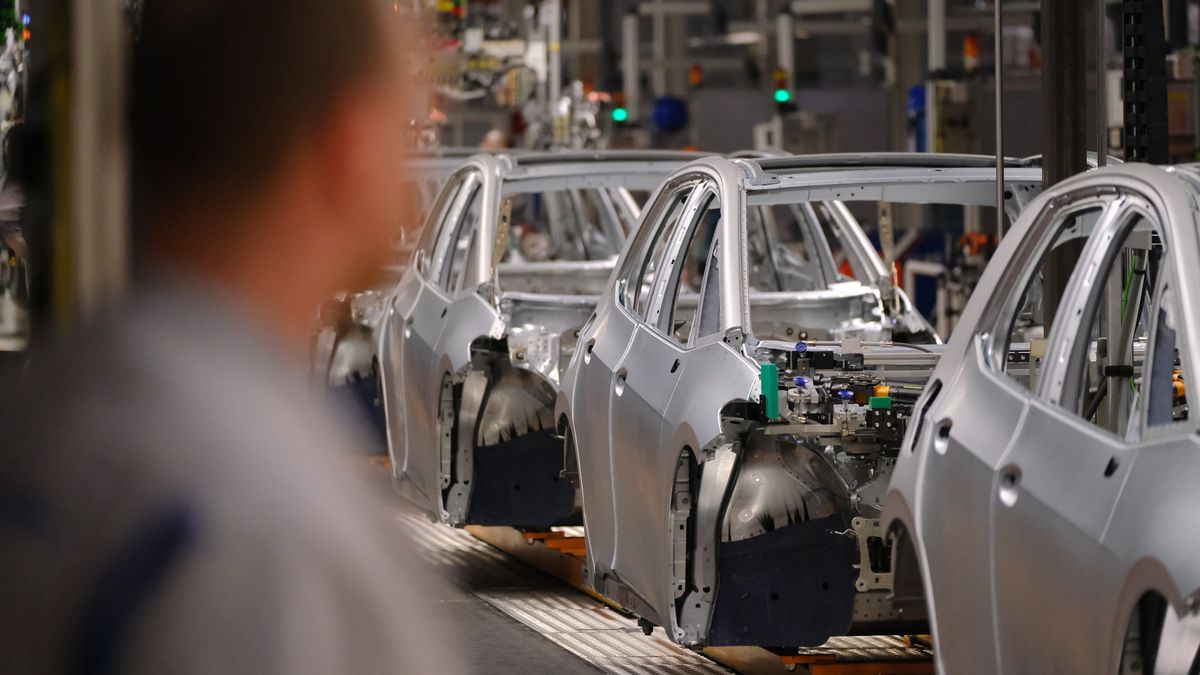 ZWICKAU, GERMANY - FEBRUARY 25: A worker oversees assembly of bodies of the ID.3 electric car at the Volkswagen factory on February 25, 2020 in Zwickau, Germany. Volkswagen is gradually revving up ID.3 production at the Zwickau plant from a current 110 per day to an eventual 1,500. The Zwickau plant is the first of its many factories that Volkswagen is retooling from producing combustion engine cars to only producing electric cars. Sales of the ID.3 will begin this summer.    (Photo by Sean Gallup/Getty Images)