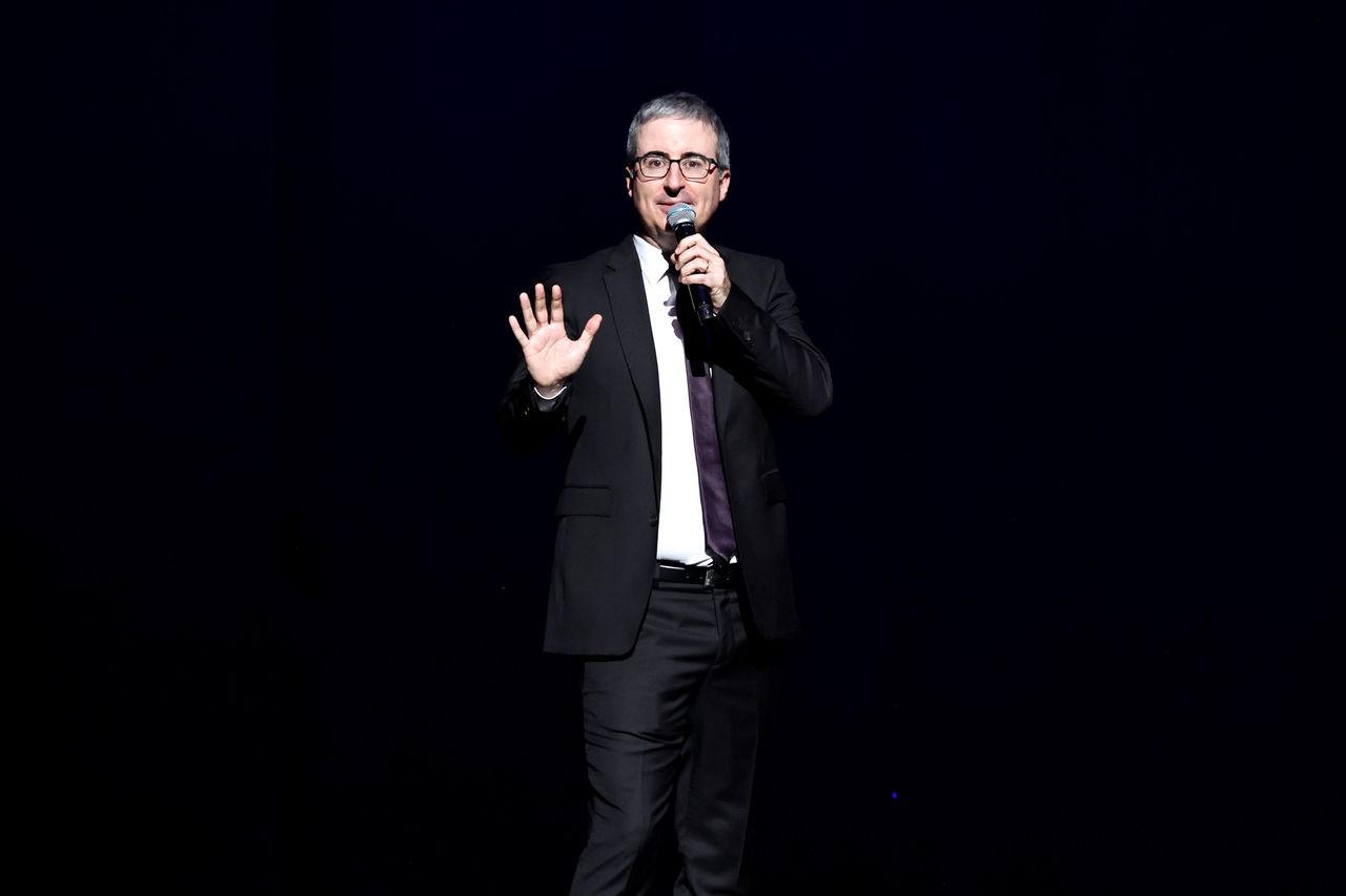 NEW YORK, NEW YORK - DECEMBER 11: John Oliver performs onstage during 2023 Night of Too Many Stars benefiting NEXT for AUTISM at Beacon Theatre on December 11, 2023 in New York City. (Photo by Jamie McCarthy/Getty Images for Night of Too Many Stars)