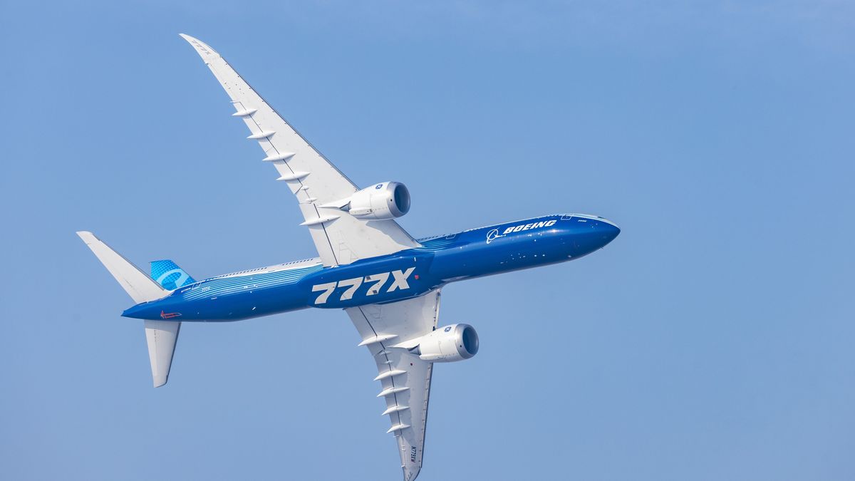 An experimental Boeing 777X aircraft during a flying display at the Dubai Air Show in Dubai, United Arab Emirates, on Tuesday, Nov. 18, 2025. The airshow runs from Nov. 17–21, with expanded space and advanced air mobility pavilions this year. Photographer: Walaa Alshaer/Bloomberg via Getty Images