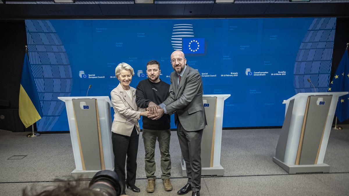 Volodymyr Oleksandrovych Zelenskyy the President of Ukraine (C) as seen with Charles Michel president of the EUCO (R) and Ursula von der Leyen President of the European Commission (L) united holding their hands together and smiling following the end of the joint press conference with statements, talking and answering questions from journalists from international media, after the meeting with the European Leaders heads of states. All three of them chanted ''Slava Ukraini'' translated as Glory to Ukraine, the national Ukrainian salute known as symbol of Ukrainian sovereignty and resistance to foreign aggression. Ukrainian President Zelenskiy attends the EU Leaders Summit, the European Council at the headquarters in Brussels. Zelensky pleads to the allies to deliver combat fighter jet planes to Ukraine. His presence in Brussels was followed after a short trip in London and Paris. Brussels,  Belgium on February 9, 2023 (Photo by Nicolas Economou/NurPhoto via Getty Images)