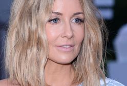 Rozenek pozuje z wtulonym synkiem. Henio rośnie jak na drożdżach