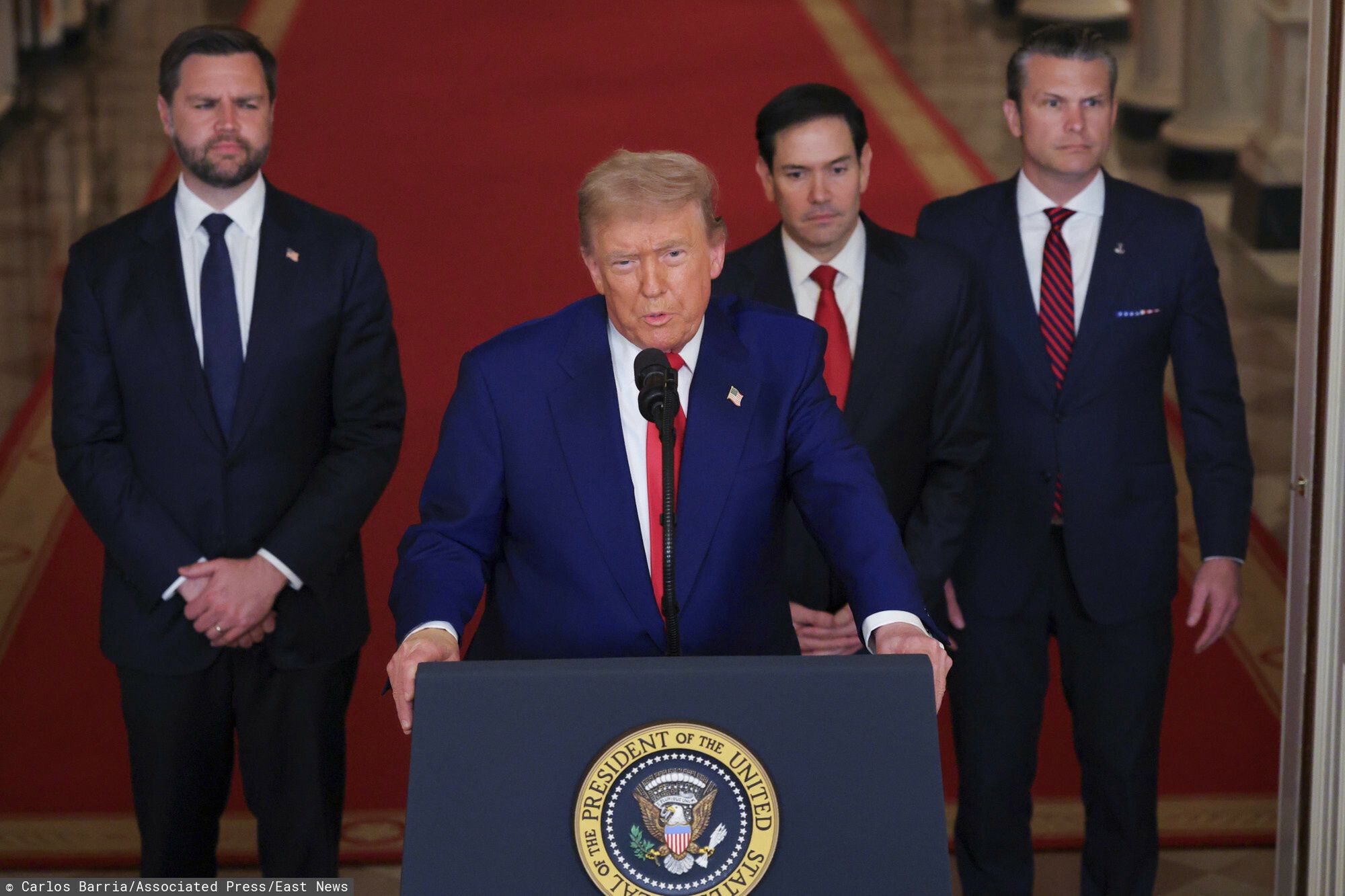 Temporary
President Donald Trump speaks from the East Room of the White House in Washington, Saturday, June 21, 2025, after the U.S. military struck three Iranian nuclear and military sites, directly joining Israel's effort to decapitate the country's nuclear program, as Vice President JD Vance, Secretary of State Marco Rubio and Defense Secretary Pete Hegseth listen. (Carlos Barria/Pool via AP)
Carlos Barria