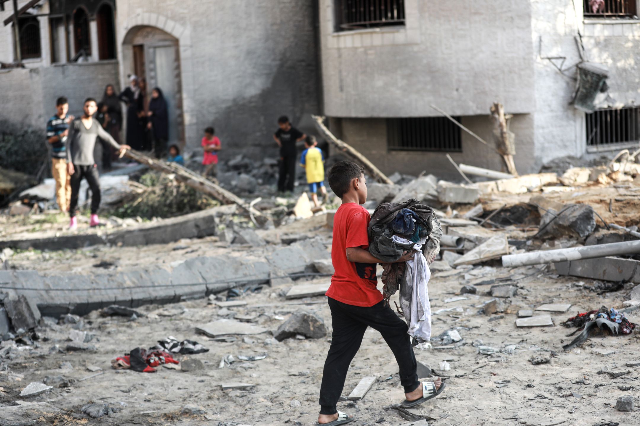 GAZA CITY, GAZA - JULY 8:  Palestinians search through the rubble of destroyed homes, inspecting the damage and locate survivors after an Israeli airstrike on the Tel al-Hawa neighborhood in the southern Gaza Strip on July 8, 2025, in the Gaza City, Gaza. (Photo by Abdalhkem Abu Riash/Anadolu via Getty Images)