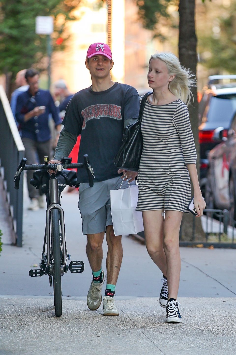 *EXCLUSIVE* Kai Schreiber beams with a mystery companion after Fashion Week buzz in NYCUlices Ramales / BACKGRID / Backgrid USA / ForumKai Schreiber, Mystery Guy, Striped Dress, Converse Sneakers, Street Style, Hand in Hand, Smiling, New York City, Fashion Week, Rising Star, Casual Outing, Style, Fashion