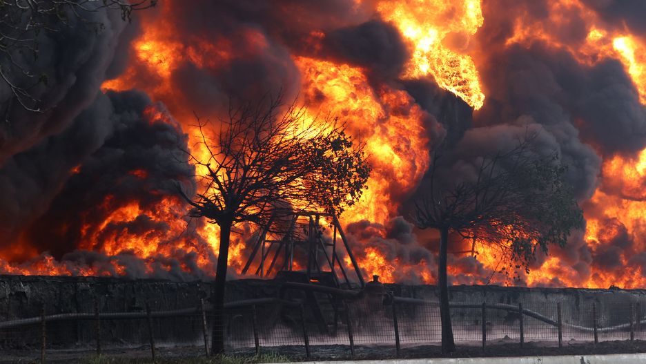 MAKEYEVKA, DONETSK PEOPLE'S REPUBLIC - MAY 4, 2022: A view of an oil depot hit by fire. The oil depot's surroundings were shelled by the Armed Forces of Ukraine. The Russian Armed Forces are carrying out a special military operation in Ukraine. Peter Kovalev/TASS