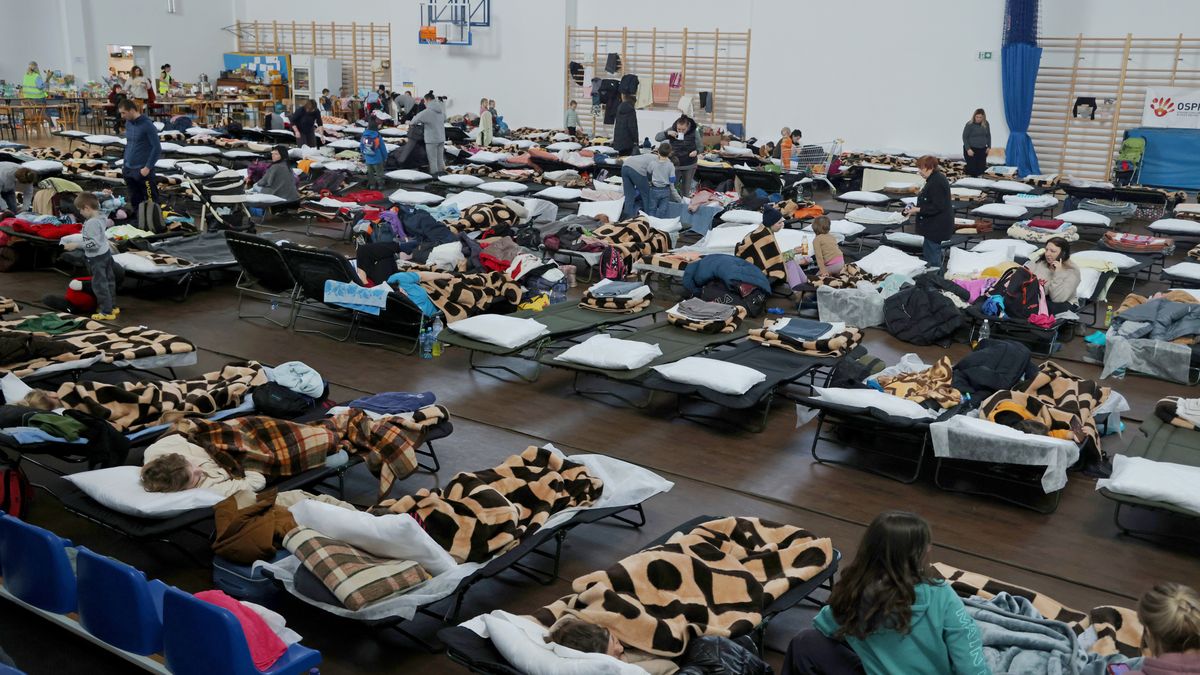 Over 1 Million Ukrainians Arrive In Poland Seeking Refuge From Russian InvasionPRZEMYSL, POLAND - MARCH 14: Women and children who have fled war-torn Ukraine bide time in a shelter set up in a primary school not far from the Ukrainian border on March 14, 2022 in Przemysl, Poland. The country was already home to a large Ukrainian population of around 1.5 million, the region's largest, making Poland a major destination for refugees from the current war. (Photo by Sean Gallup/Getty Images)Sean Gallup