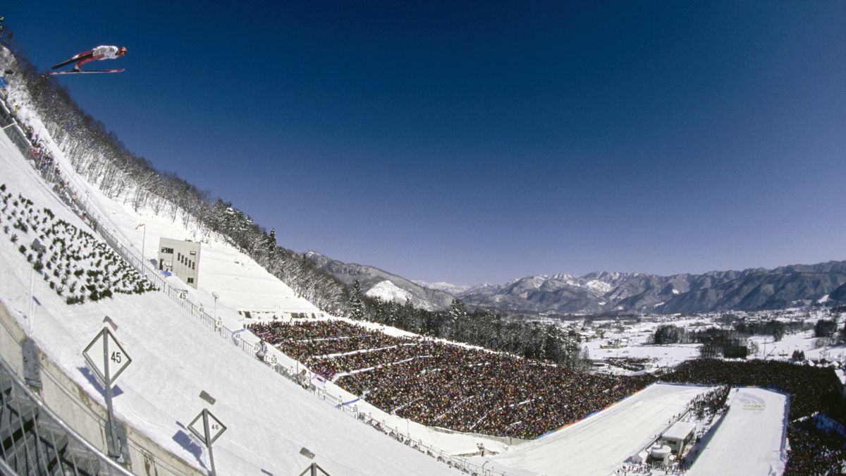 General view of a ski jumper launching off the ramp during the Men's K90 Individual Normal Hill Ski Jump competition on 11th February 1998 during the XVIII Olympic Winter Games at the Hakuba Ski Jumping Stadium, Nagano, Japan. (Photo by Al Bello/Allsport/Getty Images)