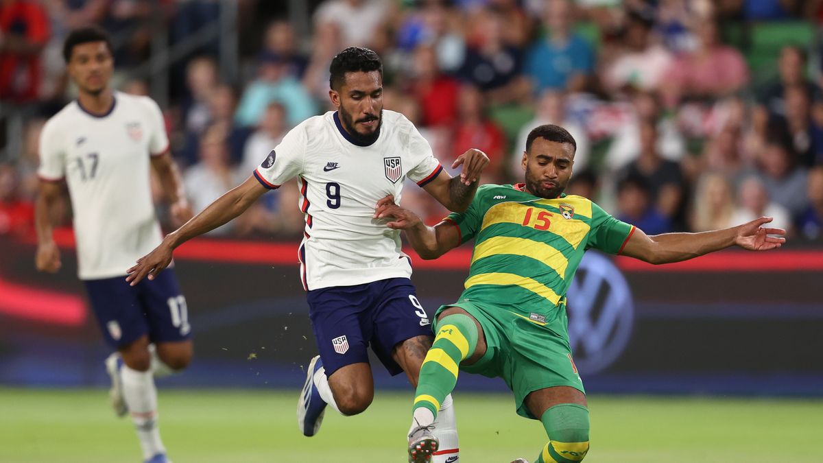 AUSTIN, TX - JUNE 10: Jesus Ferreira #9 of United States and Ashley Charles #15 of Grenada fight for the ball during CONCACAF Nations League match between Grenada and United States at Q2 Stadium on June 10, 2022 in Austin, Texas. (Photo by Omar Vega/Getty Images)