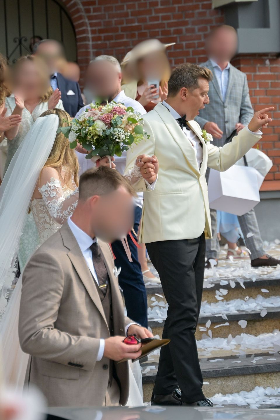 Rafał Brzozowski z żoną po ślubie