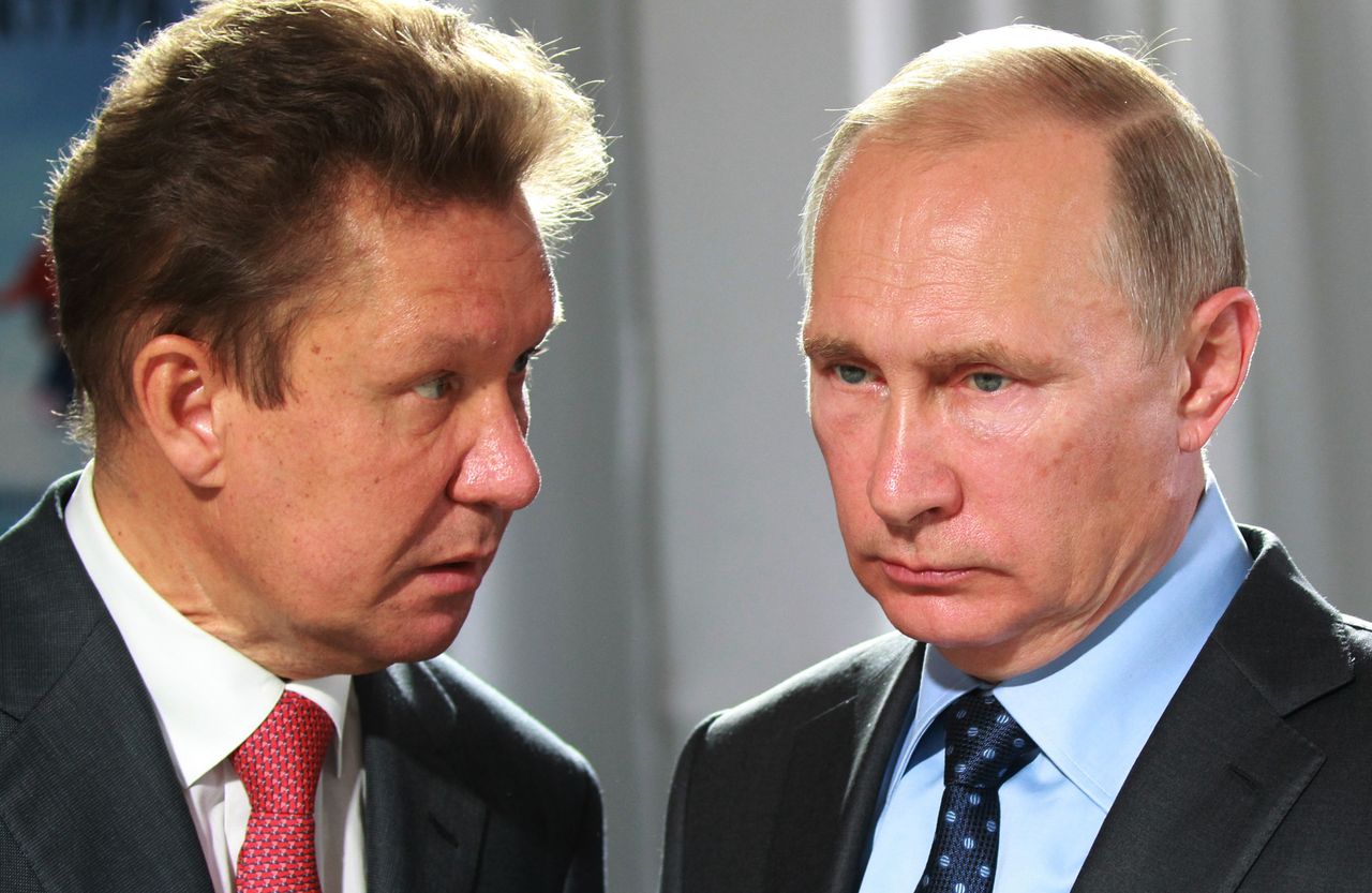 Gazprom President Alexey Miller and Vladimir Putin