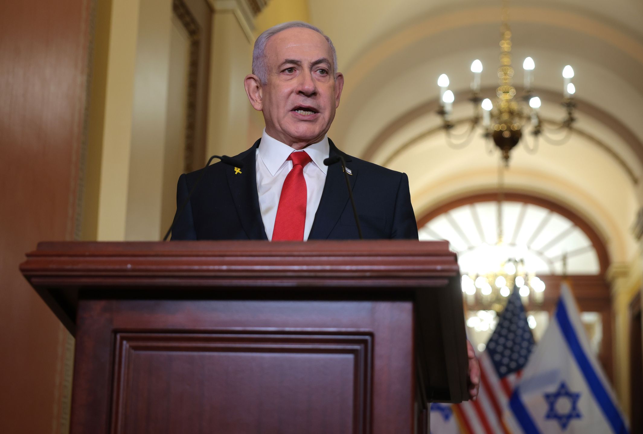 WASHINGTON, DC - FEBRUARY 07: Israeli Prime Minister Benjamin Netanyahu delivers remarks following a meeting with U.S. Speaker of the House Mike Johnson (R-LA) at the U.S. Capitol on February 07, 2025 in Washington, DC. Netanyahu is in Washington for talks with Republican Congressional leaders after visiting the White House for meetings with President Donald Trump, who proposed that the United States take an ownership position of Gaza, transferring millions of Palestinians out as the area is rebuilt and developed. (Photo by Kayla Bartkowski/Getty Images)