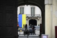 A large Ukrainian flag is seen hanging inside the courtyard of the Royal Castle, general view of Warsaw, Poland on 04 April, 2023. Ukrainian President Volodymyr Zelensky will visit Poland on Wednesday to meet with his Polish counterpart Andrzej Duda and make a public appearance meeting with Ukrainian and Polish citizens in Warsaw. (Photo by Jaap Arriens/NurPhoto via Getty Images)