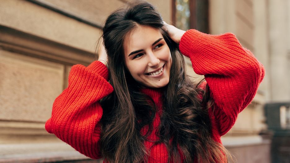 Beautiful young brunette woman smiling broadly with hands on her long hair. Outdoor portrait of pretty female model in trendy knitted red sweater posing during walking in the city street.
Beautiful young brunette woman smiling broadly with hands on her long hair. Outdoor portrait of pretty female model in trendy knitted red sweater posing during walking in the city street.
Yuricazac