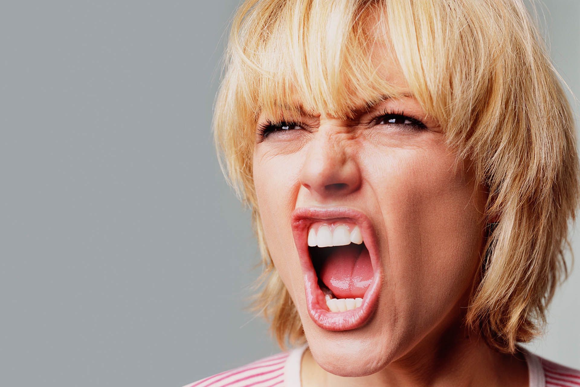Angry young womanAngry young woman.Peter Dazeleythreats, anger, aggression, frustration, intimidation