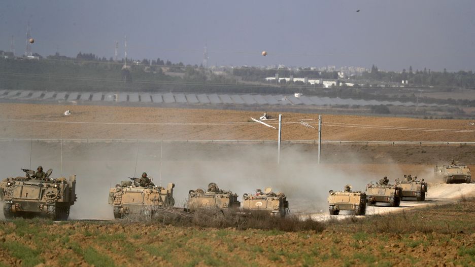 epaselect epa10916242 A column of heavy armoured personnel carriers (APCs) at an area along the border with Gaza, southern Israel, 13 October 2023. The Israel Defense Forces (IDF) on 13 October called for the evacuation of all civilians of Gaza City from their homes southwards 'for their own safety and protection' and to move south of the Wadi Gaza, warning that in the following days Israeli military operations will take place in the Palestinian city. More than 1,300 Israelis have been killed and over 3,200 others injured, according to the IDF, after the Islamist movement Hamas launched an attack against Israel from the Gaza Strip on 07 October. More than 1,500 Palestinians have been killed and over 6,600 others injured in Gaza since Israel launched retaliatory air strikes, Palestinian health officials said. EPA/ATEF SAFADI Dostawca: PAP/EPA.