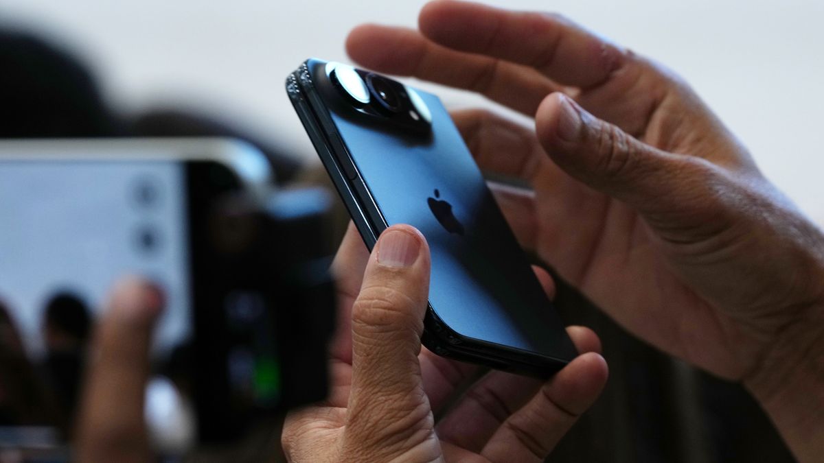 An iPhone Duo foldable smartphone during a product unveiling event at Apple Park in Cupertino, California, US, on Wednesday, Sept. 9, 2026. Apple Inc. unveiled the company's first foldable smartphone during a wide-ranging event Wednesday, betting that a new category can energize growth for its biggest-selling lineup. Photographer: David Paul Morris/Bloomberg via Getty Images