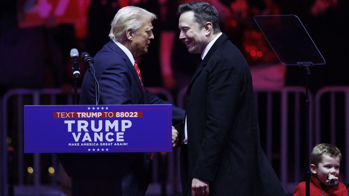WASHINGTON, JANUARY 19: 

Tesla Founder Elon Musk walks on stage with his son, X, beside President-elect Donald Trump during a rally at Capital One Arena in Washington, on January 19, 2025. Trump held a rally downtown ahead of tomorrow's 60th Presidential Inauguration. (Photo by Tom Brenner for The Washington Post via Getty Images)