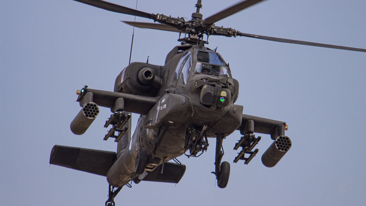 A Boeing AH-64 Apache helicopter from the Greek Army as seen flying and manoeuvering during a flying display demonstration during Athens Flying Week 2021 Air Show at Tanagra Air Base Airport. The Apache of the Hellenic military is the AH-64D Apache Longbow version. The specific aircraft is a twin turboshaft attack combat helicopter under the fuselage and on the wings with a machine gun, missiles, rocket and self defense capabilities. Greece, a country with strong air force is a member state of the North Atlantic Treaty Organization NATO. Tanagra, Greece on September 5, 2021 (Photo by Nicolas Economou/NurPhoto via Getty Images)
