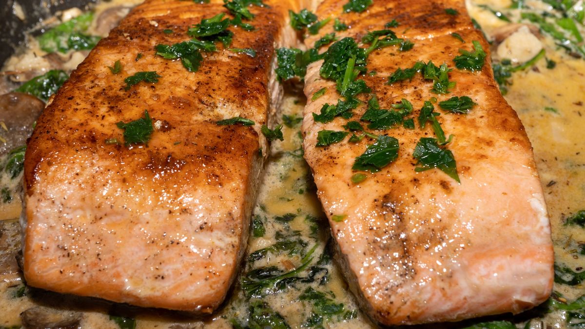 Salmon and Spinach in a Mushroom Cream Sauce
Salmon in a pan with spinach in a mushroom cream sauce
ReDunnLev
farmed salmon, wild salmon, pink, cuisine, macro, white, fat, pescatarian, creamy sauce, salmon, cream, delicious, omega, nutrition, closeup, sea fish, fresh, parmesan cream sauce, healthy, mushroom sauce, green, diet, pan seared, grill, tasty, restaurants, background, dish