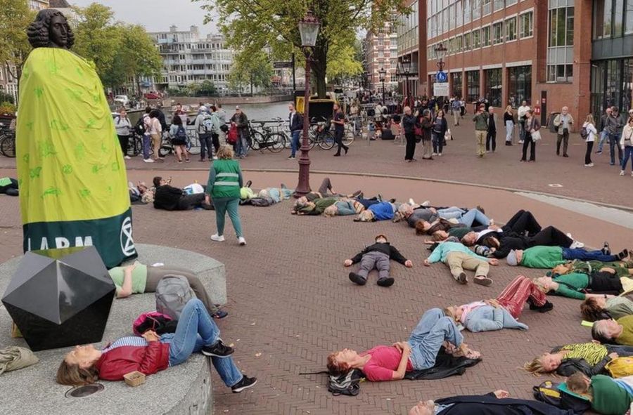 Activists stage unusual protest by playing dead on the ground