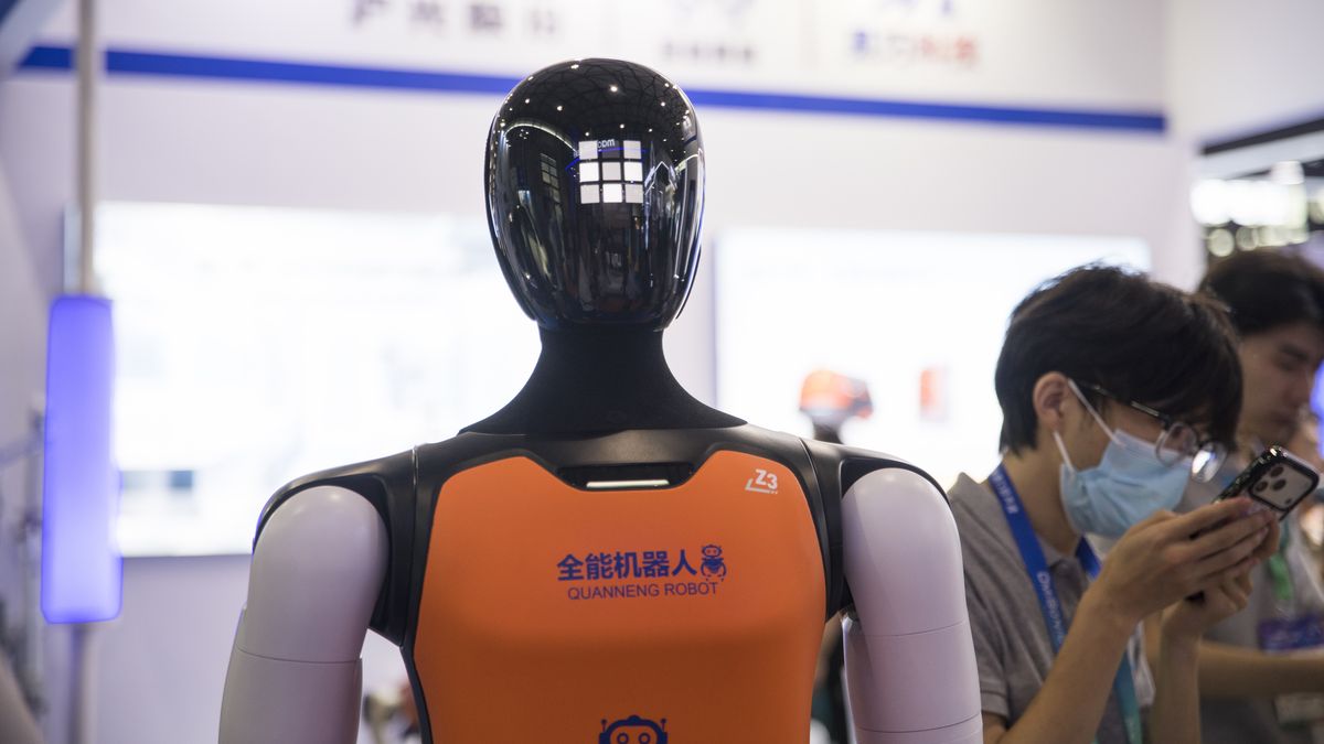 SHANGHAI, CHINA - AUGUST 12: A humanoid robot with a bright orange chest and a black helmet is displayed at the 2026 Fourth Shanghai Embodied Intelligence Robot Industry Exhibition on August 12, 2026 in Shanghai, China. The 2026 China General Artificial Intelligence Industry Conference and Exhibition features advancements in AI and robotics technologies. (Photo by Shi Ying/VCG via Getty Images)